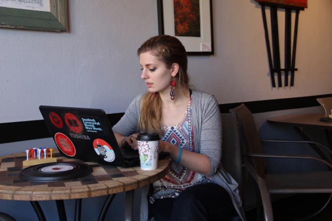 A woman researching Bitcoin