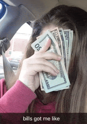 Girl wipes tears with cash before paying bills