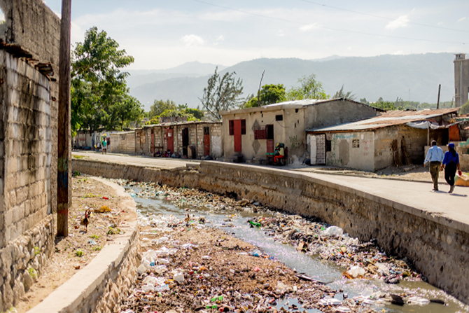 A clogged water source in Port-au-Prince, Haiti