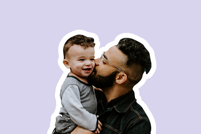 Father kissing his son goodbye as he leaves for work.