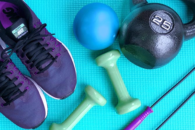 Fitness equipment, shoes and a yoga mat