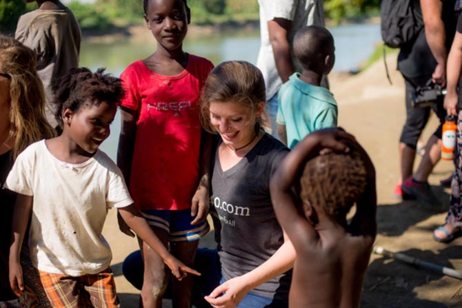 The 1040.com blogger laughing with Haitian children in Lubin, Haiti