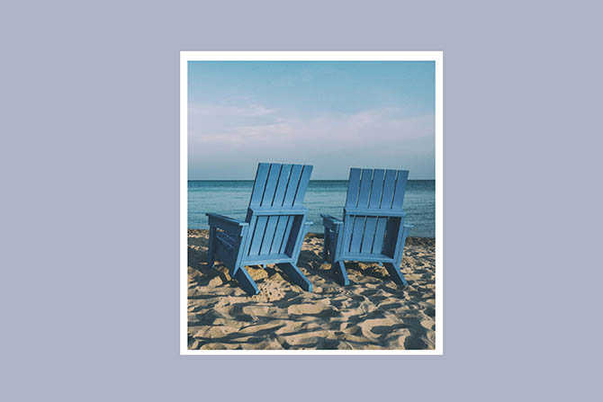 Two chairs on a beach