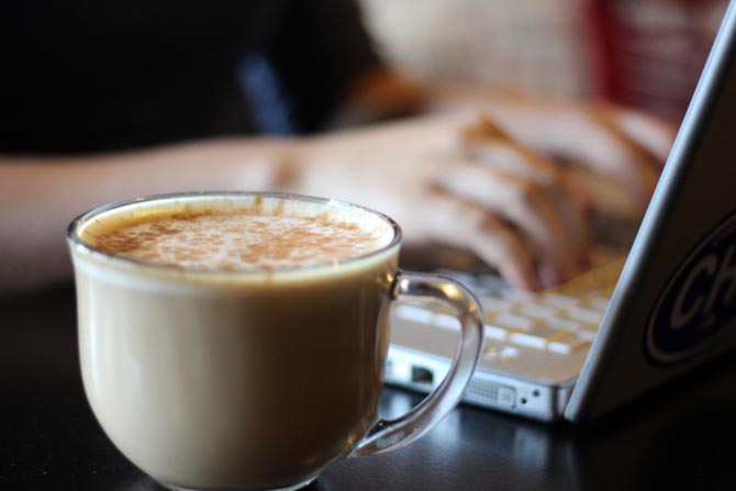 A taxpayer researching the new tax bill at a coffee shop