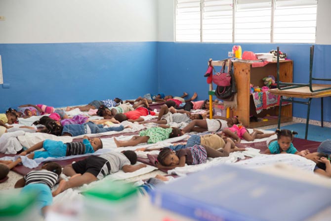 Dominican Republic children enjoying a nap at their preschool in El Almendro.