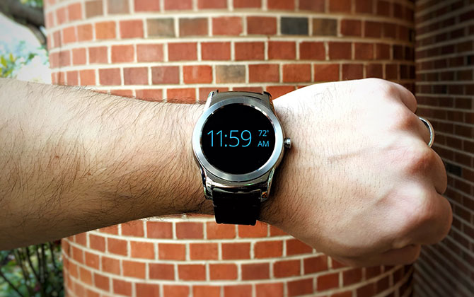 Man uses smart watch to check the time at the last minute.]