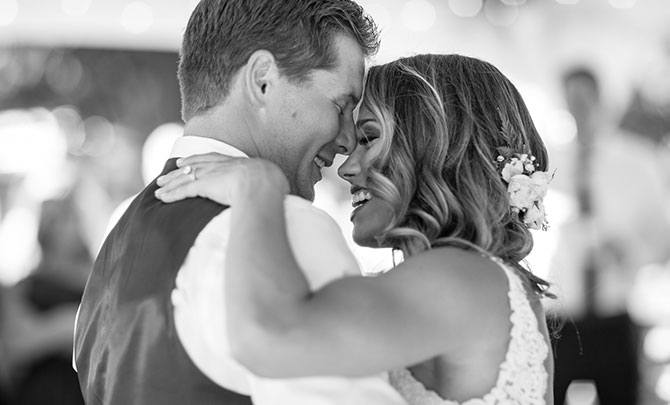 A beautiful couple sharing their first dance together at their wedding.